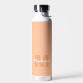 Koel pastelkleurig perzik kleur met aangepaste mon waterfles (Links)