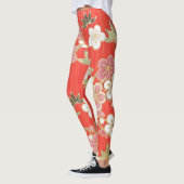 Koel verschillende kleurenbloemen op oranje achter leggings (Links)