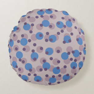 koelblauw, roze en paarse stippen rond kussen