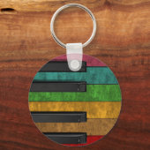 Koelkleurig antiek grijnsteeneffect piano sleutelhanger (Voorkant)