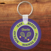 Koeltennisslogan, paarse en groene sleutelhanger (Voorkant)