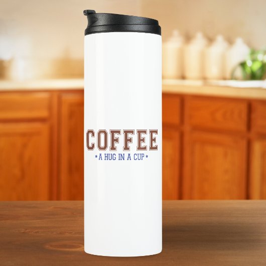 Koffie: Een beker in een beker met touwtjes