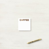 Koffie gemaakt van koffiebonen en drank post-it® notes (Op bureau)