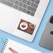 Koffiebeker en croissant op tafel sticker (Laptop met iPhone)