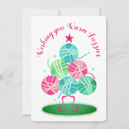 Kogels van brei- en haakwerk met kerstkaart