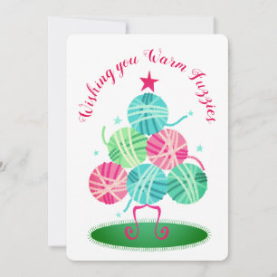 Kogels van brei- en haakwerk met kerstkaart