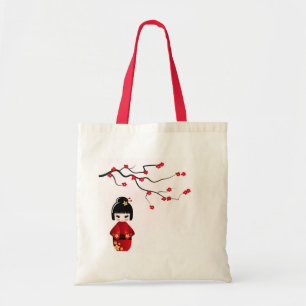 Kokeshi-pop onder sakura-tak tote bag