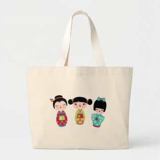 kokeshi trio grote tote bag