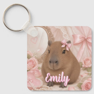 kokette capybara roze strik sleutelhanger
