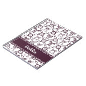 Kokette knooplint in maroon notitieboek (Linkerzijde)