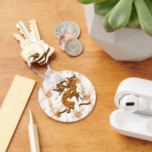 Kokopelli-muzikant met muzieknoten sleutelhanger