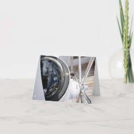 Kompas dat de richting geeft aan een avontuur.  bedankkaart