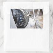 Kompas dat de richting geeft aan een avontuur. rechthoekige sticker (Tas)