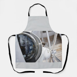 Kompas dat de richting geeft aan een avontuur.  schort