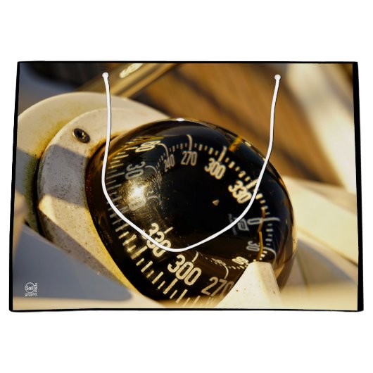 Kompas helpt navigeren en koer behouden.  groot cadeauzakje (Voorkant)