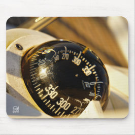 Kompas helpt navigeren en koer behouden.  muismat