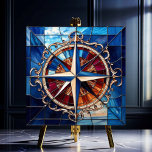 Kompas Roos met Scroll Border gebrandschilderd-gla Tegeltje<br><div class="desc">De Compass Roos met Scroll Border Stainglass Look Tegel is voorzien van het Compass Roos ontwerp in blauw en zilverkleurig op een achtergrond van blauw, amber en rood met een sierlijke scrollrand in antiek. Deze tegel heeft een glas-in-loodraam. Er zijn vele mooie toepassingen voor deze prachtige tegels. Verkrijgbaar in 2...</div>