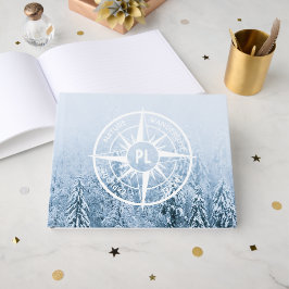 Kompassterembleem monogram winter sparrenbos gastenboek