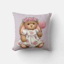 Konijn in een witte jurk met een roze lolly kussen