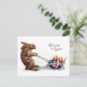  konijn trekt paasei feestdagenkaart (Staand voorkant)