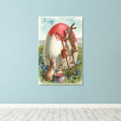 Konijnen die een eieren schilderen canvas afdruk (Insitu (Houten vloer))