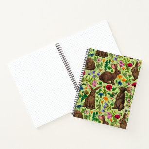 Konijnen en wilde bloemen op honingdauw groen notitieboek
