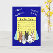 Konijnen lezen over konijnenverzorging: donkerblau kaart (Gele Bloem)