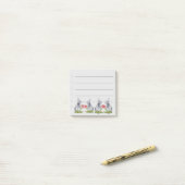 Konijnen op een rij post-it® notes (Op bureau)