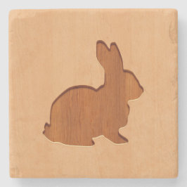 Konijnensilhouet gegraveerd op houten ontwerpen stenen onderzetter