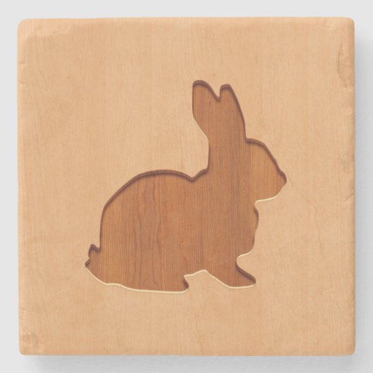 Konijnensilhouet gegraveerd op houten ontwerpen stenen onderzetter (Voorkant)