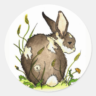 Konijntje in de paardenbloemen ronde sticker