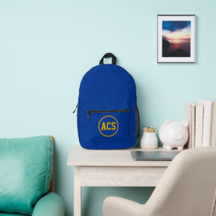 Koninklijk blauwe en gouden schoolkleuren en lette bedrukte rugzak