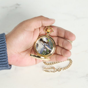 Kookaburra naast een bloeiende boom, horloge