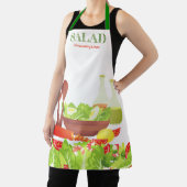 Kookgerei op salade is een moeilijke keuken schort (Insitu)