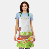 Kookgerei op salade is een moeilijke keuken schort (Gedragen)