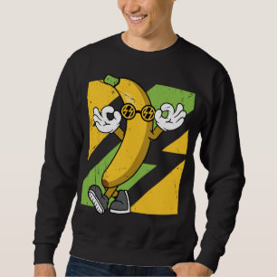 Koolbanaan met zonnebril trui