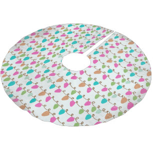 Koorden van gekleurde lichterij kerstboom rok