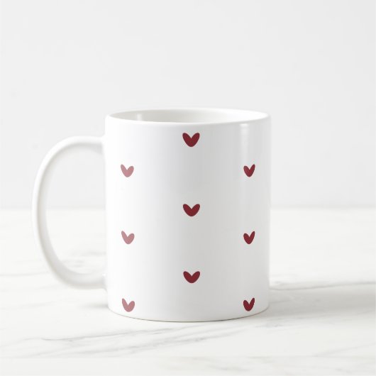 Kopje met minimalistisch patroon van kleine rode h koffiemok (Links)