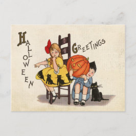 Koppel kinderen met uitgeholde pompoen, Halloween Briefkaart