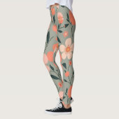 Koraal en roze bloemen op groen leggings (Links)