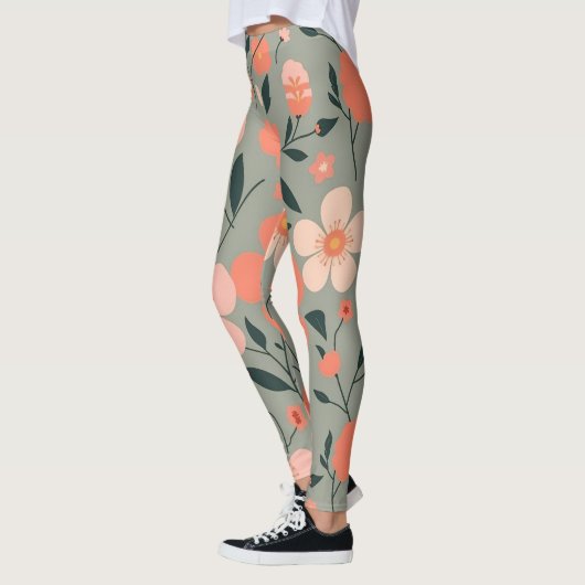 Koraal en roze bloemen op groen leggings (Links)