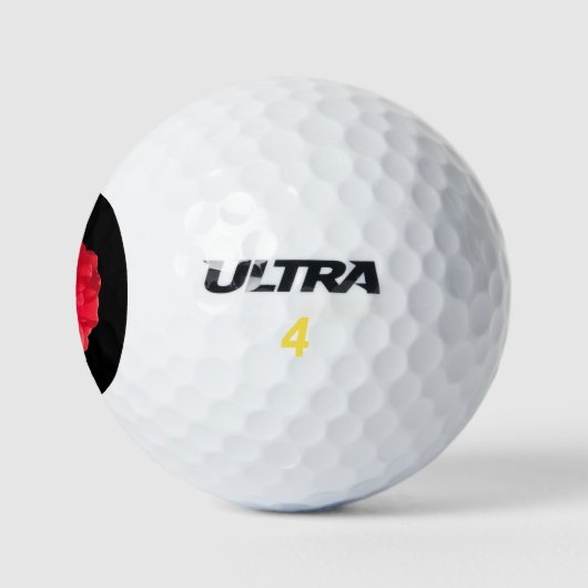 Koraalkleurig roos op zwart golfballen (Logo)