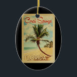 Koraalspeling Palm Tree Vintage Travel Keramisch Ornament<br><div class="desc">Een unieke retro mid-eeuwse moderne Coral Springs Florida-kunstfoto in de klassieke stijl van het poster. Het bevat een gebogen palmboom op zandige stranden met oceaan onder een blauwe troebele hemel.</div>