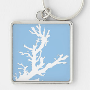 Koraaltak - wit op bleek blauw sleutelhanger