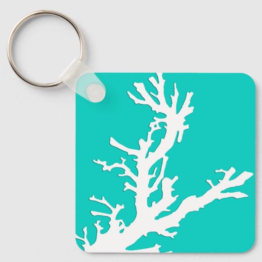 Koraaltak - wit op turquoise sleutelhanger (Voorkant)