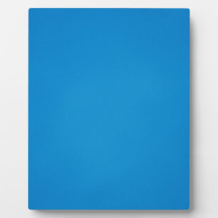 Korrelige helderblauwe achtergrond fotoplaat