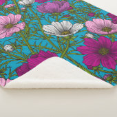 Kosmos-mix op blauw sherpa deken (3/4)