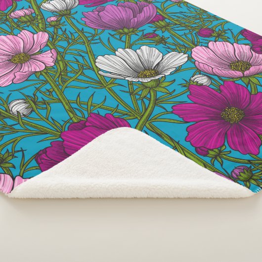 Kosmos-mix op blauw sherpa deken (3/4)