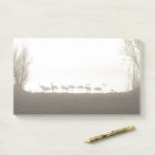 Kraanvogels in de mist post-it® notes (Op bureau)