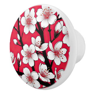 Krachtige kersenbloesemillustratie op rood keramische knop